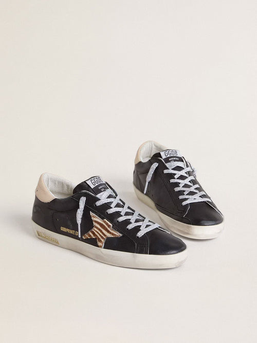 GOLDEN GOOSE Women’s Super-Star in black nappa leather with zebra-print pony skin star and beige leather heel tab | 黃金鵝 女款 Super-Star 黑色納帕皮革款，搭配斑馬紋小馬皮星星與米色皮革後跟標籤（黑色）